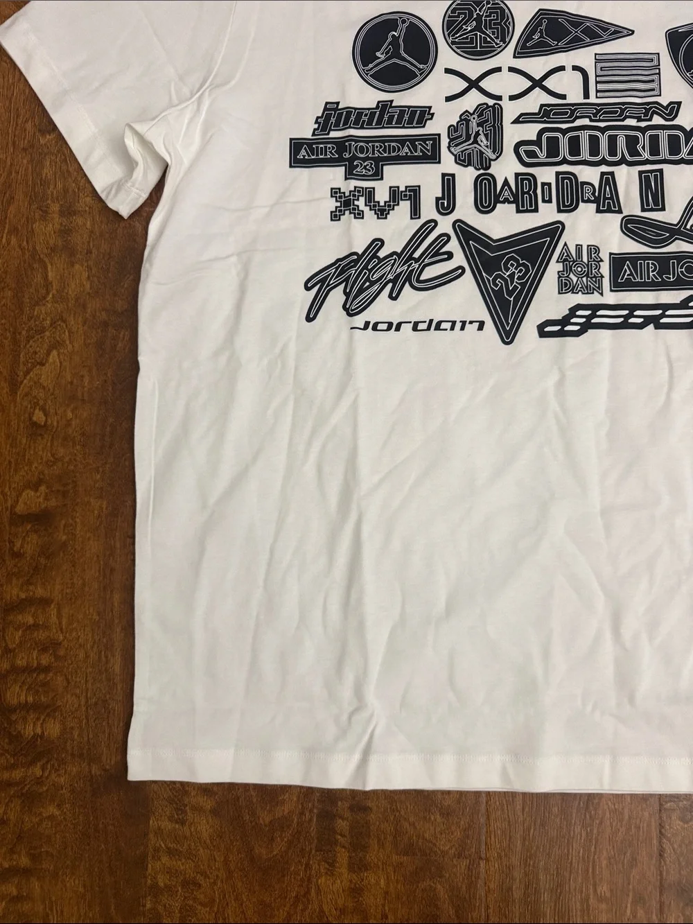 Jordan White Short-Sleeve Tee with Navy Logo Collage
